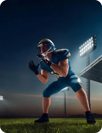 Football player under stadium lights